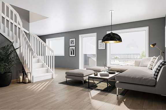 Stue mot kjøkken og trapp opp til innredet 3. etasje/loft