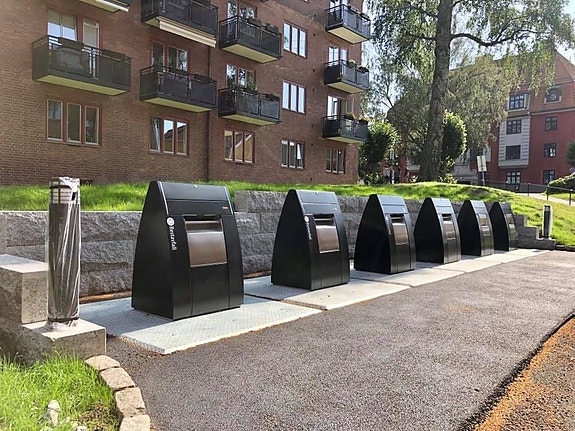 Nedgravde containere for et mer hygienisk og trivelig miljø.