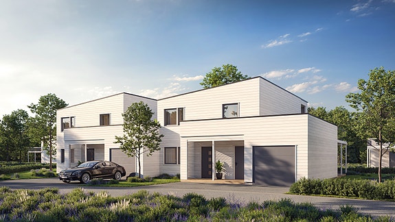 Fasader mot øst - atkomsten til boligen - legg merke til de store terrassene som strekker seg langs hele boligen.