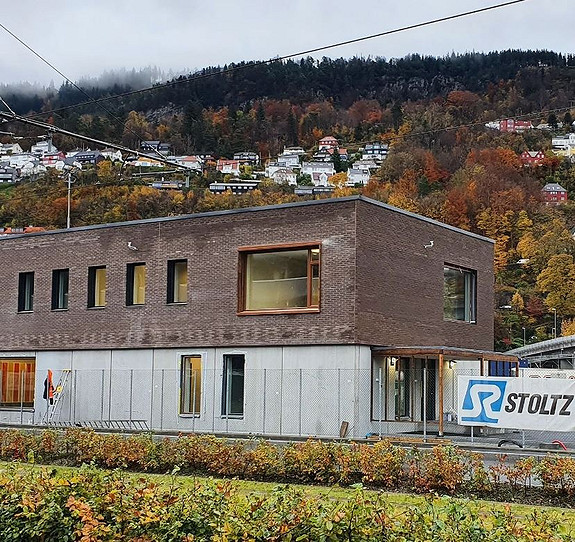 Stoltz Rehab AS utfører teglsteinsforbledning.