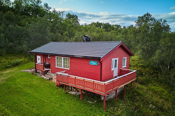 Koselig hytte på Nord-Rygge i Bø som ligger høyt og fritt til med god og usjenert beliggenhet.