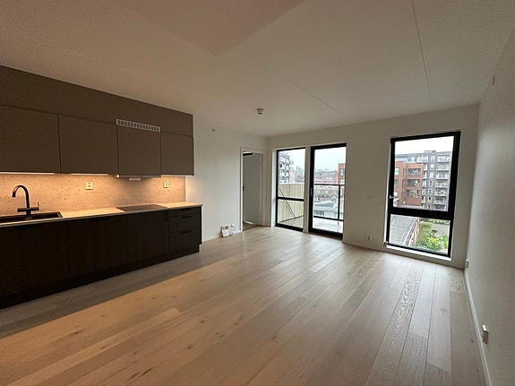 Åpen løsning mellom stue og kjøkken