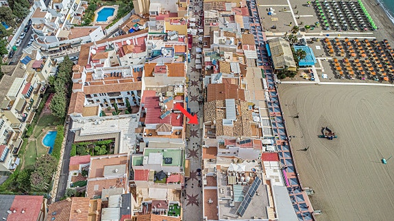 Gate med sjarmerende kafeer, butikker og et utvalg restauranter