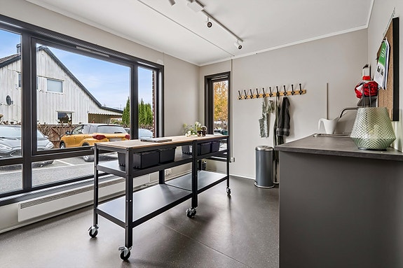 I borettslaget finnes sjarmerende fellesområder til glede for beboerne