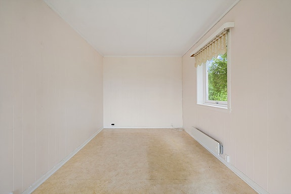 Egen sone i stuen som kan brukes som TV-stue, spisestue eller kanskje en avslappende sone