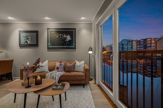 Velkommen til Nygata 28b - en delikat 3-roms selveier ved Nidelvas bredd!