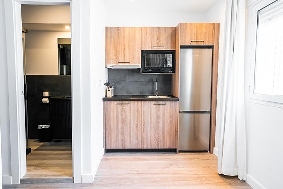 Unik penthouse i Nueva Andalucía - delt opp i 7 studioer med turistlisens og solid leieinntekt