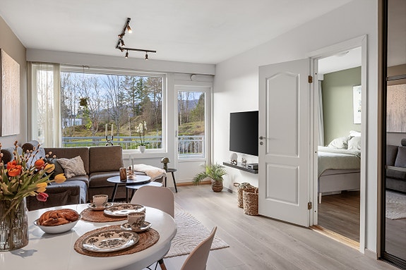 Fredsbergvegen 15 presenteres av Krogsveen v/eiendomsmegler Robert T. Iversen