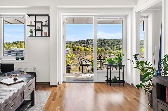 Velkommen til Olaf Helsets vei 1A - en lys og trivelig 2-roms selveierleilighet i 5. etasje med heis.