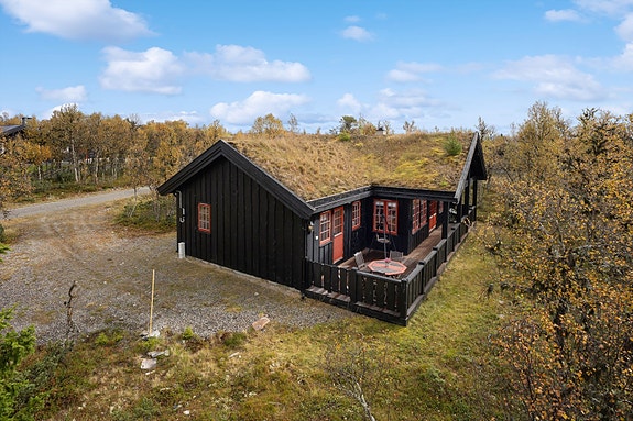 Myåsen 12 er en pen fritidsbolig med flott beliggenhet på Venabygd.