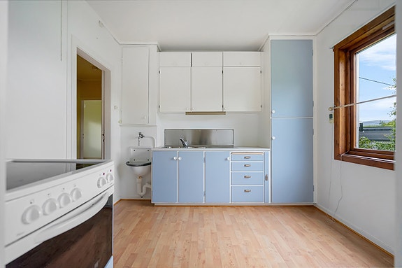 Kjøkken med eldre innredning