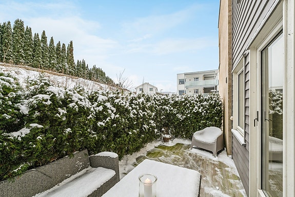 Terrasseplatting av treverk.