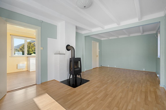 Vedovnen gir både varme og stemning på kalde vinterdager - et naturlig midtpunkt i rommet