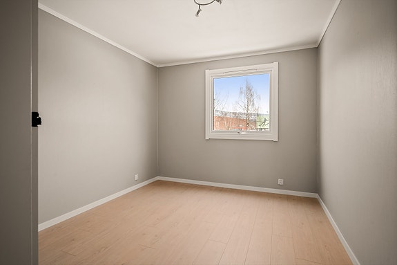 Et innbydende rom for hvile og avslapning med moderne uttrykk.