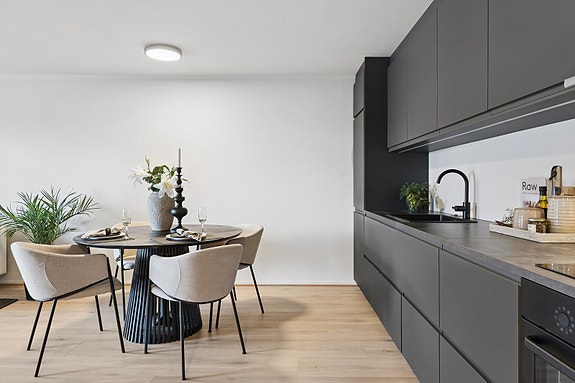 Kjøkken med hyggelig spiseplass