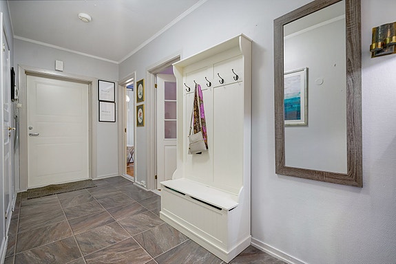 Entré med plass for oppbevaring av yttertøy.