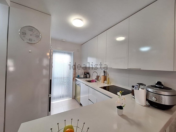 Romslig rekkehus med 3 soverom, terrasser og felles basseng