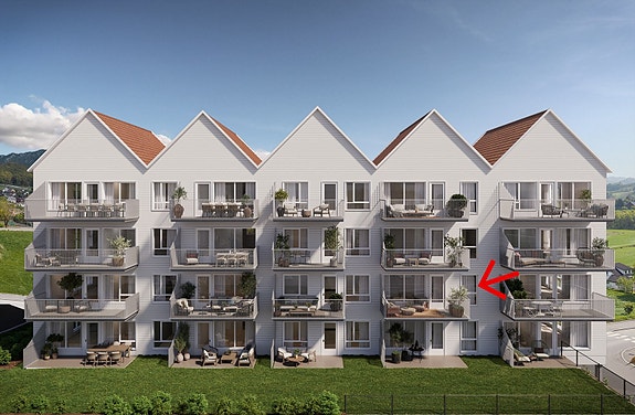 Her ligger leiligheten med en solrik terrasse