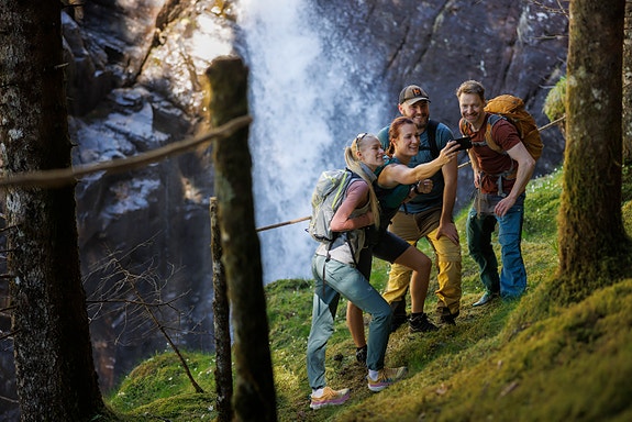 Tour guiding waterfall, mountains, lakes, caves, coastline.