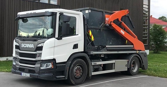 Liftdumper med kontainer