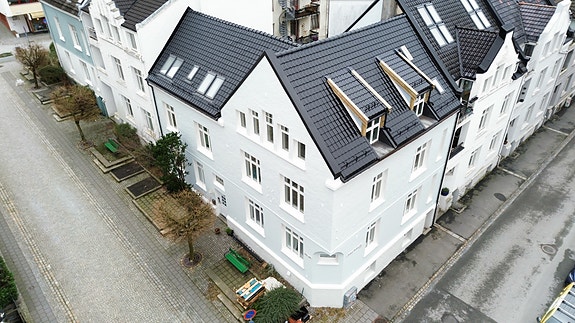 En slik bygård er typisk oppdrag for oss.