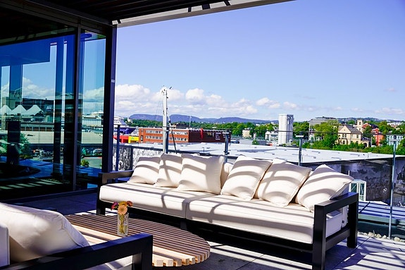 Work from the terrace when the sun is out - or close the roof and turn on the lights to enjoy the view at night!