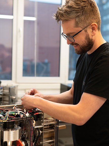 Our Head of Coffee and Customer Success is hard at work on a maintenance demo with a customer.