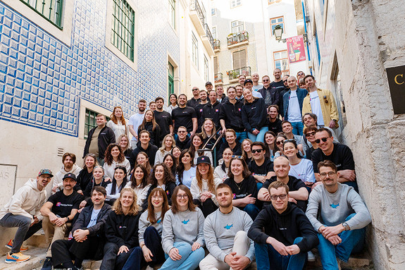 Each year, the whole company goes on a kickoff. Pictured is our 2025 kickoff in Lisbon, Portugal.