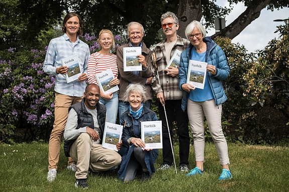 Hos oss får du være med å spre turinspirasjon sammen med mange kjekke frivillige. Foto: John Petter Nordbø