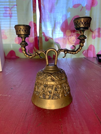 Antikk klokke-lysestake