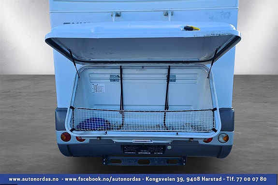  Lastekasse på bakvegg