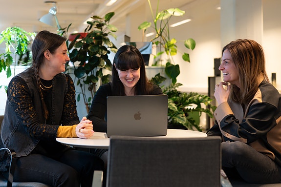Here is some of our commercial team discussing the next product launch in our headquarters, which is full of plants and sunlight.