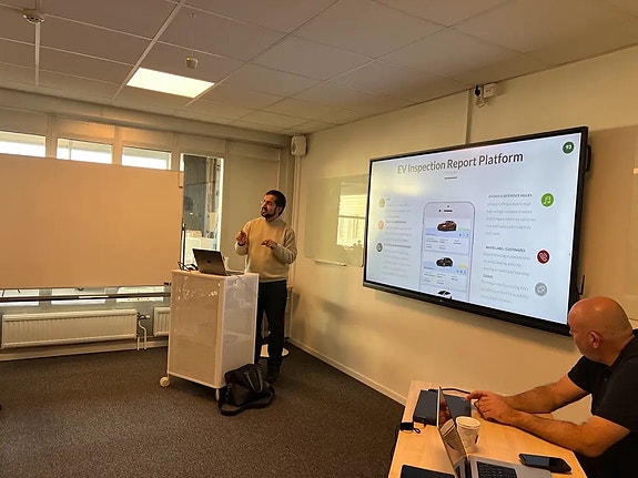 A training session with garage mechanics and owners