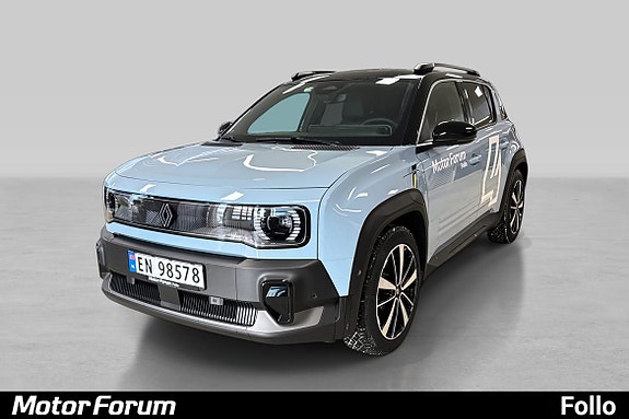 Moderne blå SUV med tofarget tak og karakteristisk frontgrill.