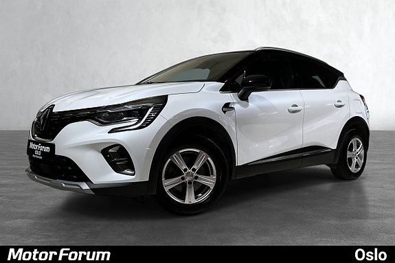 Elegant hvit SUV med moderne design og kraftfulle alloy-felger.