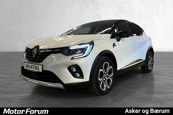 Stilren hvit SUV med karakteristisk LED-lys og robuste felger.