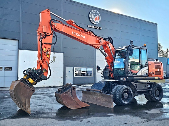 Hitachi ZX140W-5B, 2015 mod, 7041 timer, Rotortilt og 2 skuffer, Hengerfeste, Sentralsmøring.