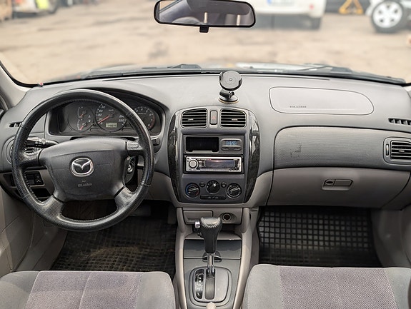 Mazda 323 9 of 16
