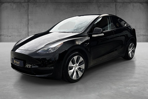 Tesla Model Y 2 of 5