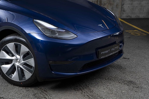 Tesla Model Y 2 of 5
