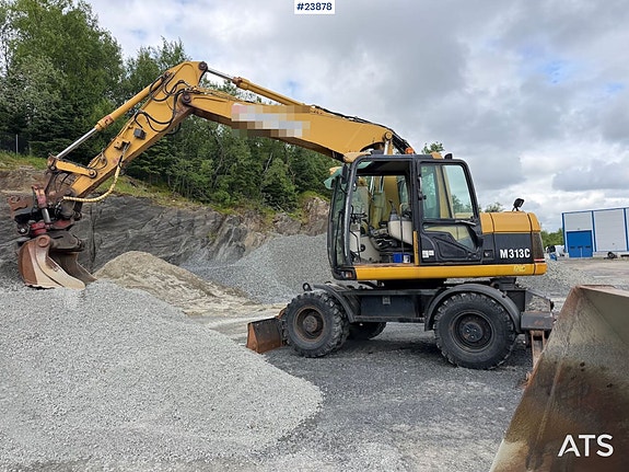 Caterpillar M313C hjulgraver m/ 2 skuffer og rototilt. SE VIDEO 2 of 5