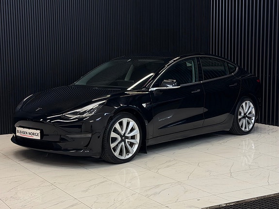 Tesla Model 3 4 of 5