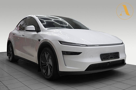 Tesla Model Y 2 of 5