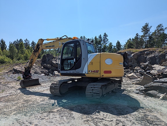 New Holland E145 3 of 5