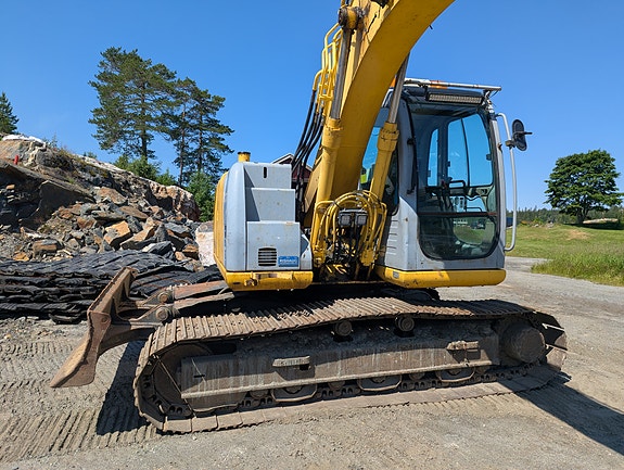 New Holland E145 24 of 30
