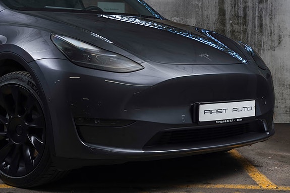 Tesla Model Y 2 of 5