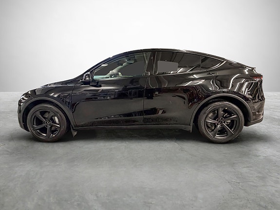 Tesla Model Y 2 of 5