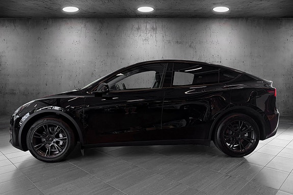Tesla Model Y 2 of 5