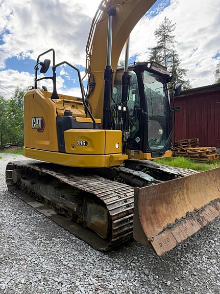 Cat 315 m/ oilquick 3 of 5