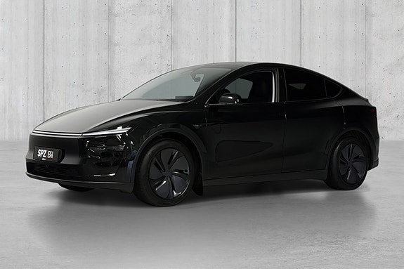 Tesla Model Y 2 of 5